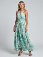 Portia | Plissiertes Halterkleid mit weichem Blumenmuster in Midi-Länge