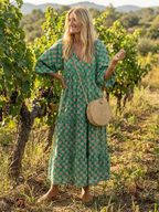 Fiora | Floral Print V-Ausschnitt Stufen Midi Kleid