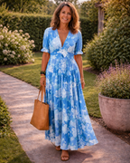 Ione | Kurzes ärmelloses V-Ausschnitt Blumen-Midi-Kleid